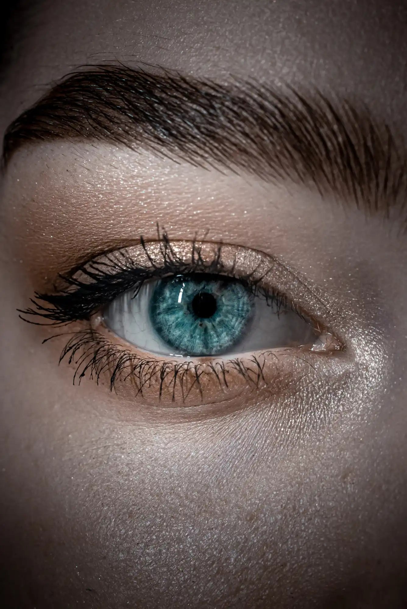 Striking blue eye with makeup.