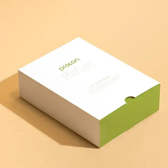 White and green prolon reset box with a minimalist design.